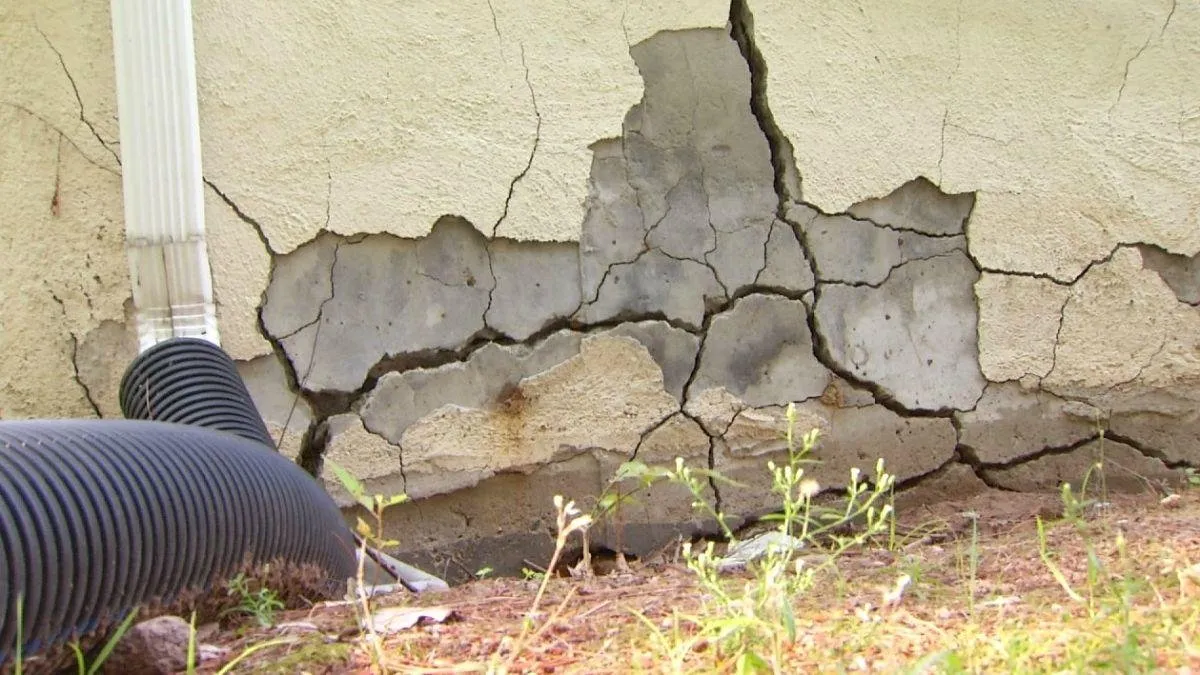 Crumbling concrete foundation showing severe pyrrhotite deterioration damage