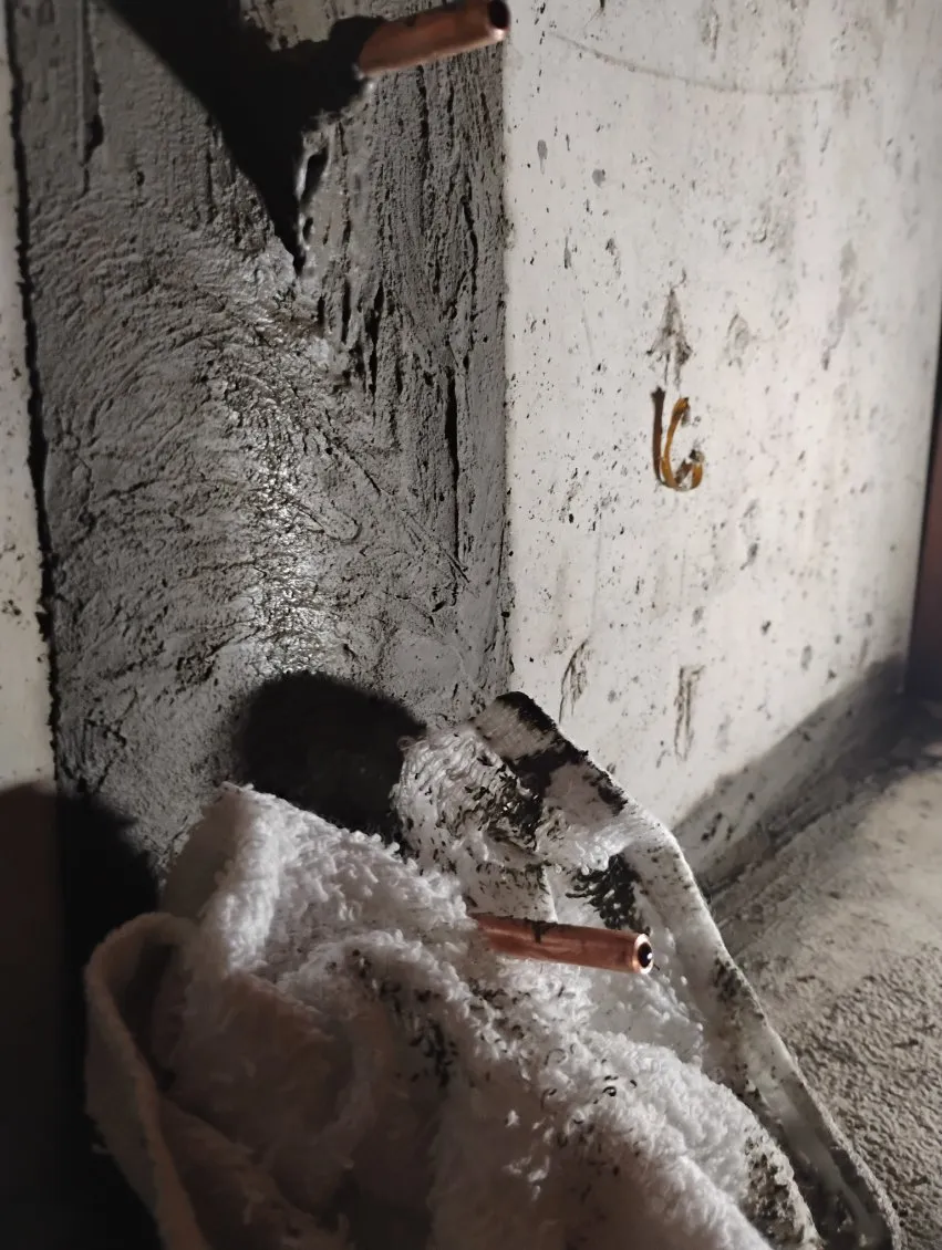 Polyurethane injection ports installed on leaking Framingham foundation crack
