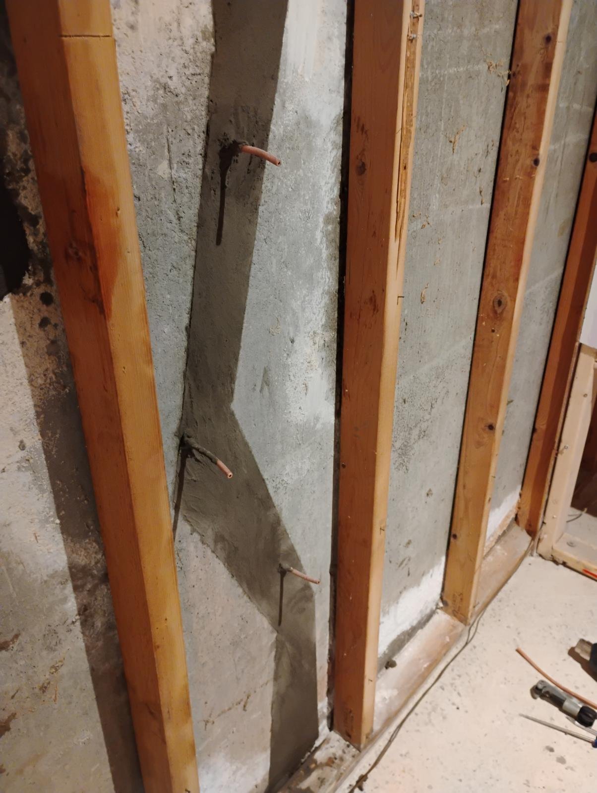 Crack injection repair in progress on Shrewsbury basement foundation