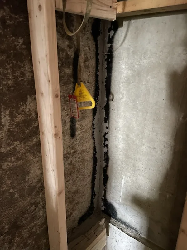 Water intrusion through basement wall crack